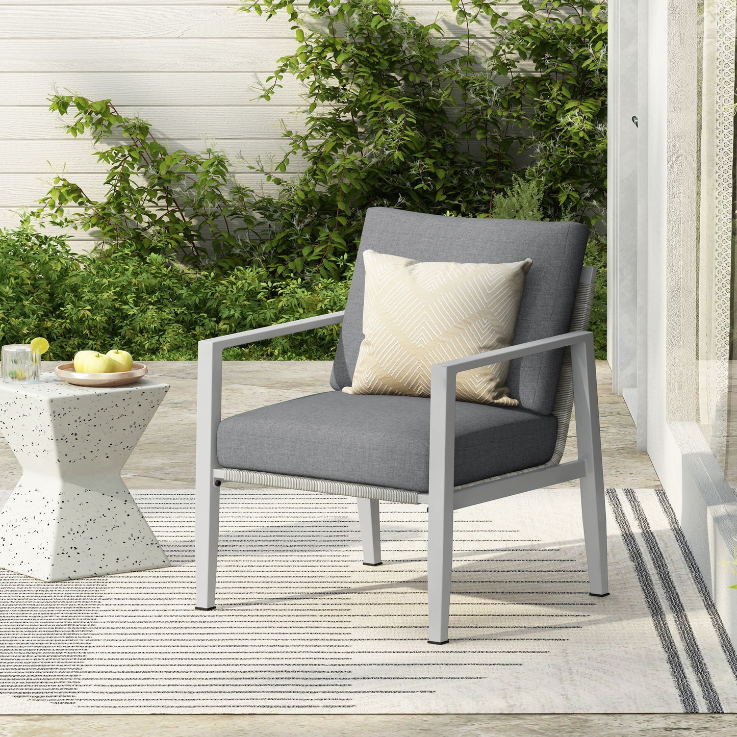 Modern Lounge Chair With Rope Accents And Cushions